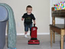 Vacuuming The Carpet